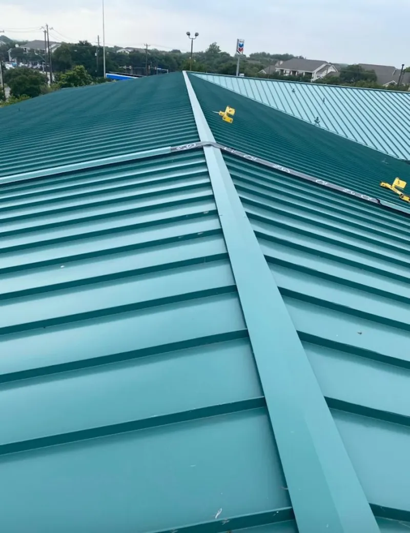 Green commercial metal roof ridge and valley for Metal Roof Repair in West Caldwell